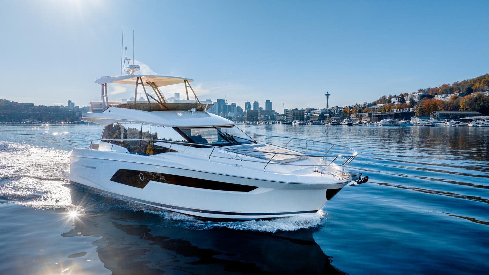 a white boat on the water aboard 2023 PRESTIGE 520 Yacht for Sale