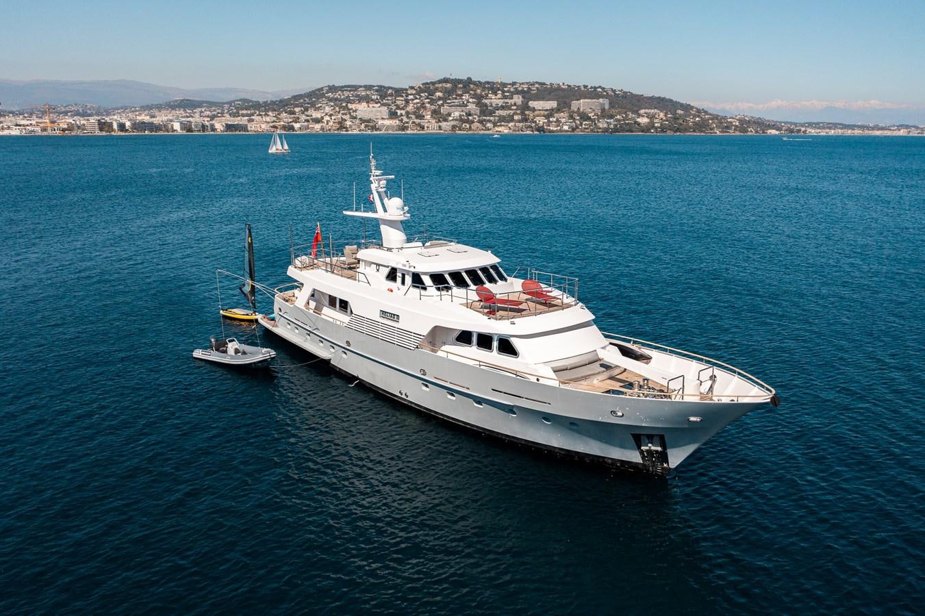 a white boat in the water aboard HELIAD III Yacht for Sale