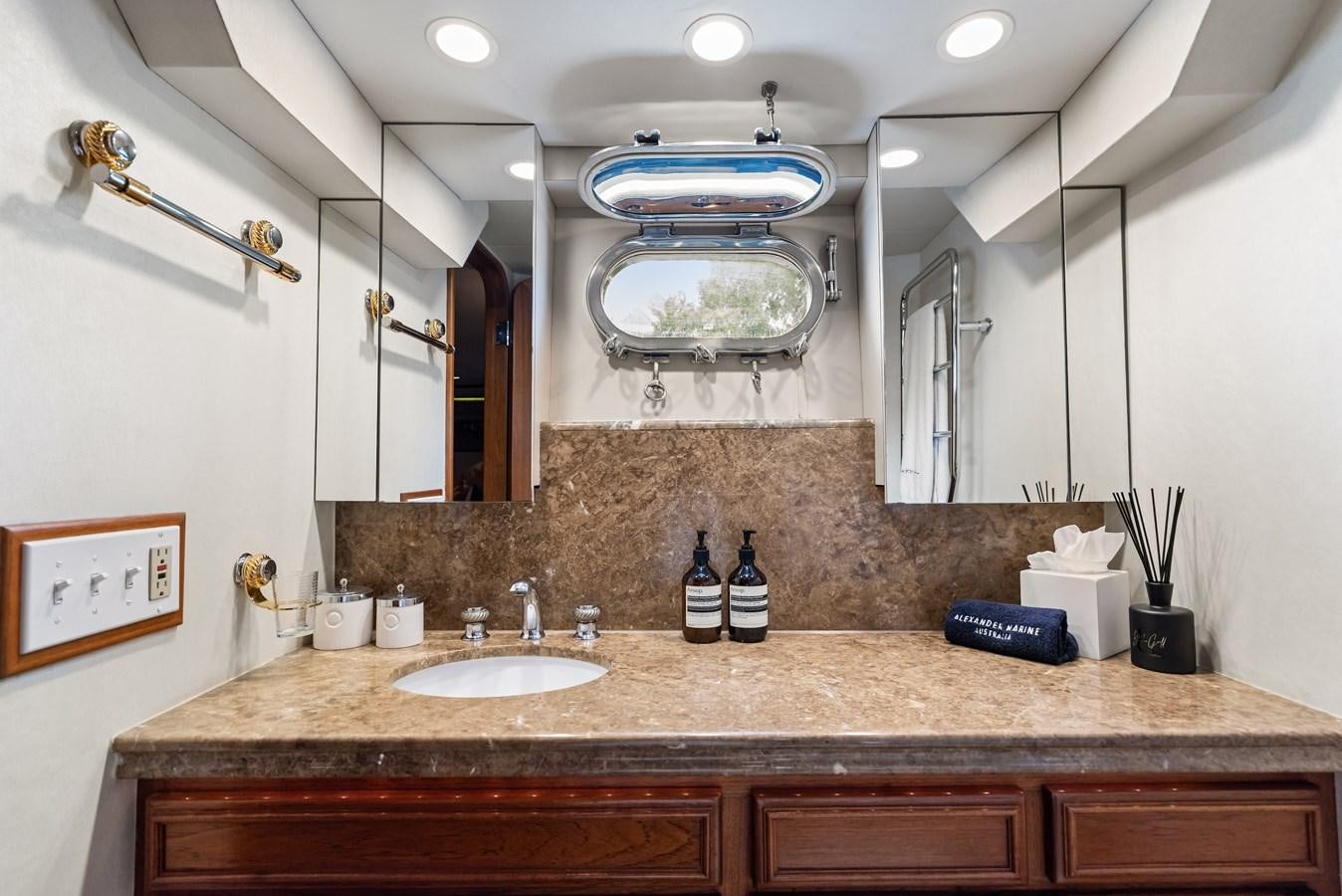 a bathroom with a marble counter top aboard HUNTRESS Yacht for Sale