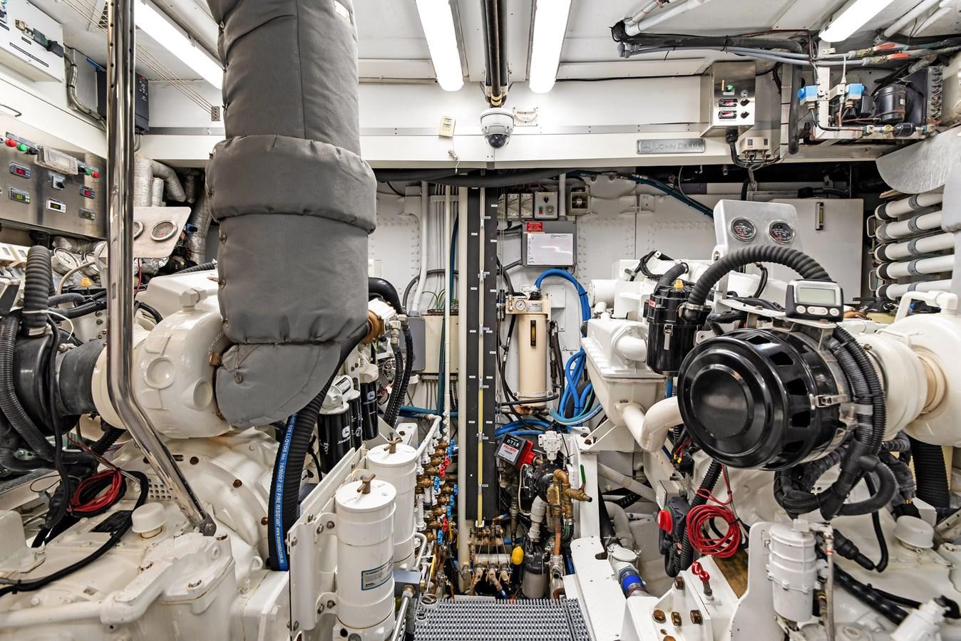 a room full of white and blue machinery aboard HUNTRESS Yacht for Sale