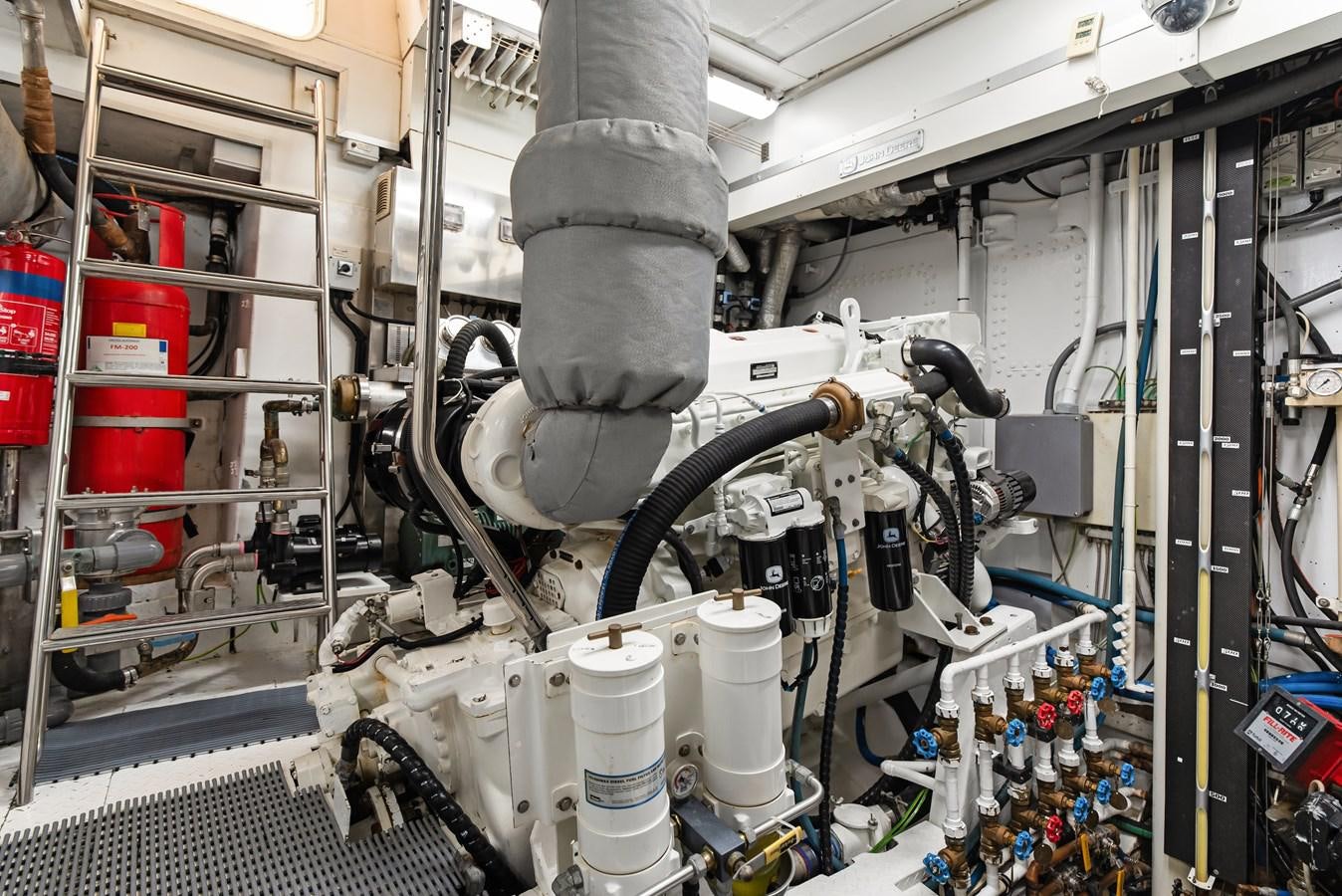 a machine with a large machine aboard HUNTRESS Yacht for Sale