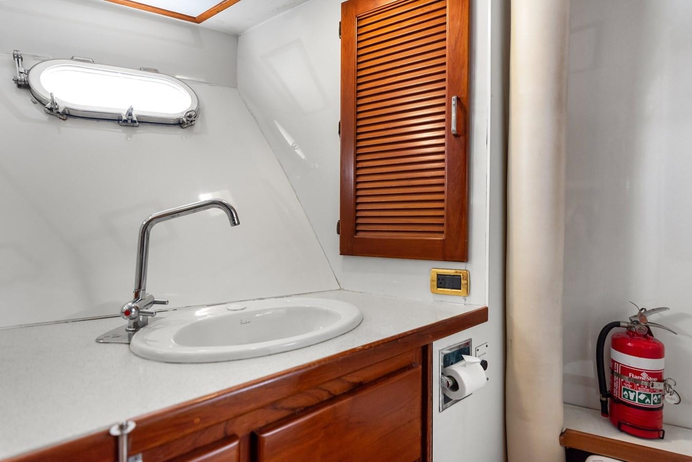a sink and a window aboard HUNTRESS Yacht for Sale