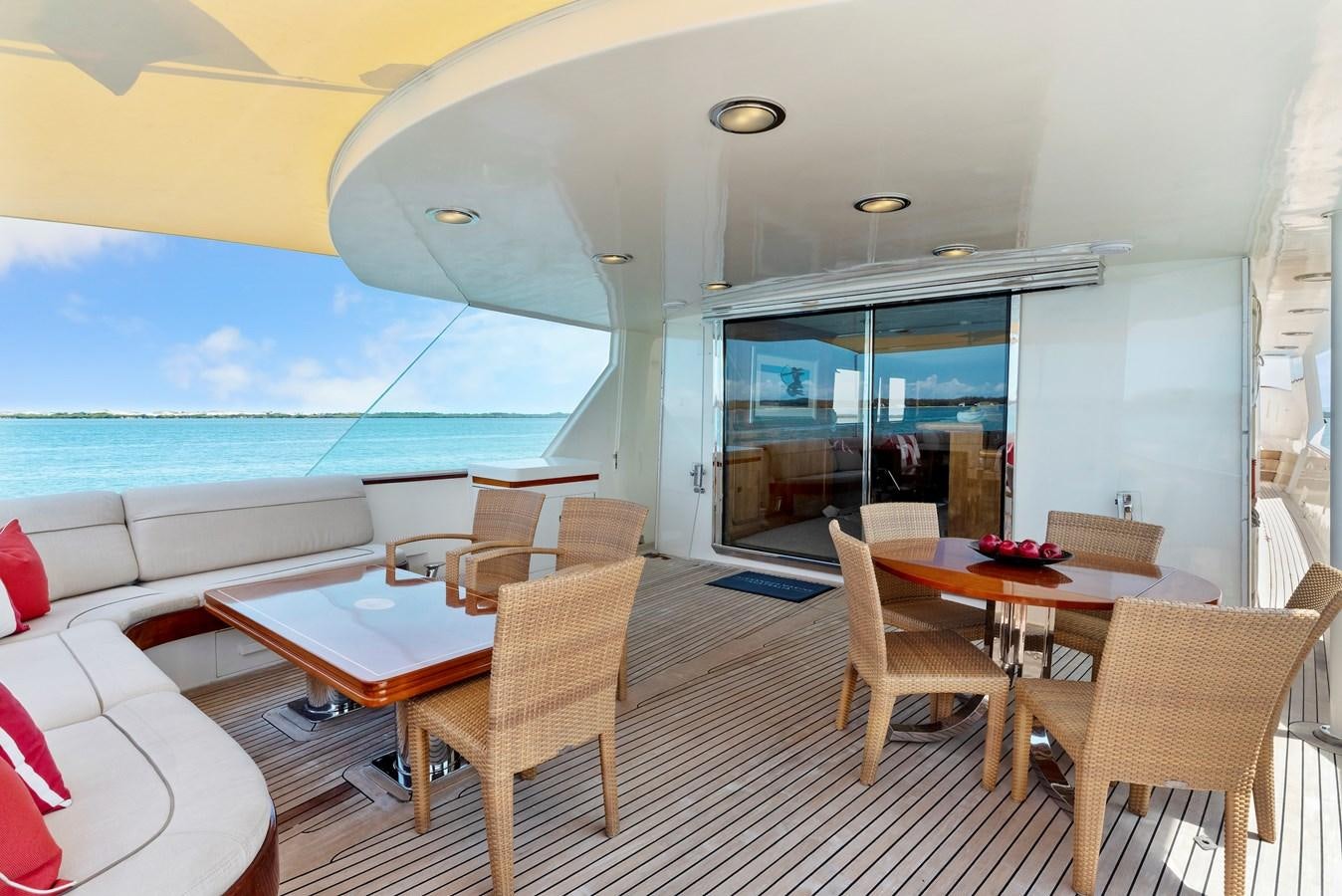 a room with a table and chairs aboard HUNTRESS Yacht for Sale