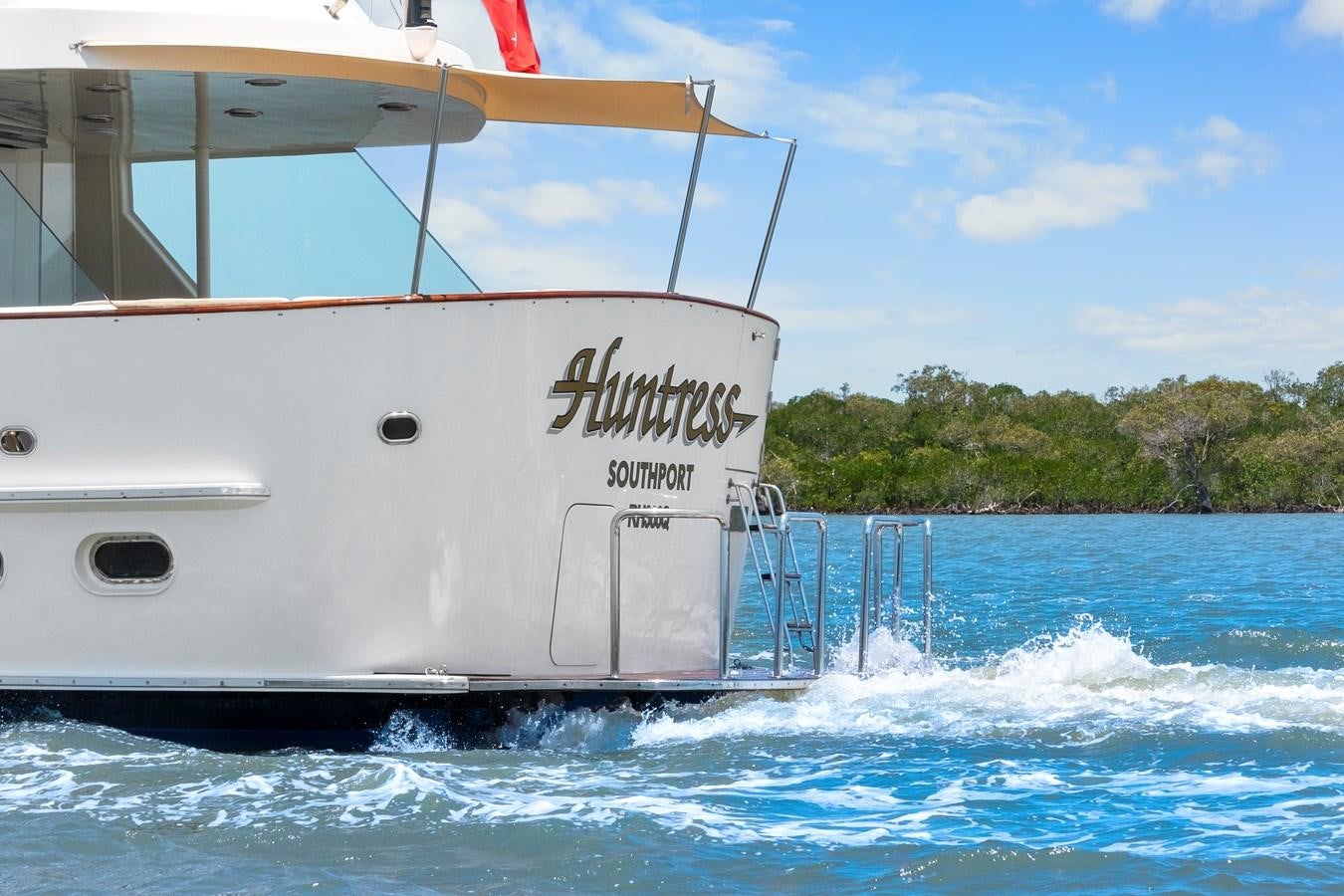 a boat splashing in the water aboard HUNTRESS Yacht for Sale