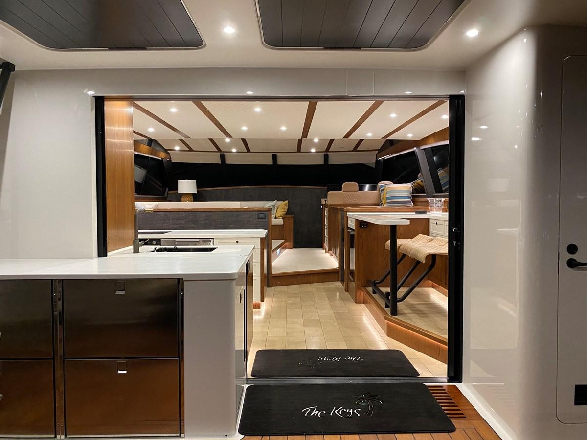 a room with a desk and a computer aboard THE KEYS Yacht for Sale