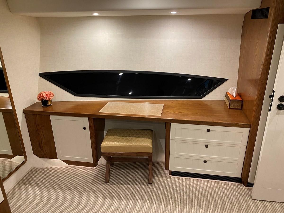 a desk with a stool aboard THE KEYS Yacht for Sale