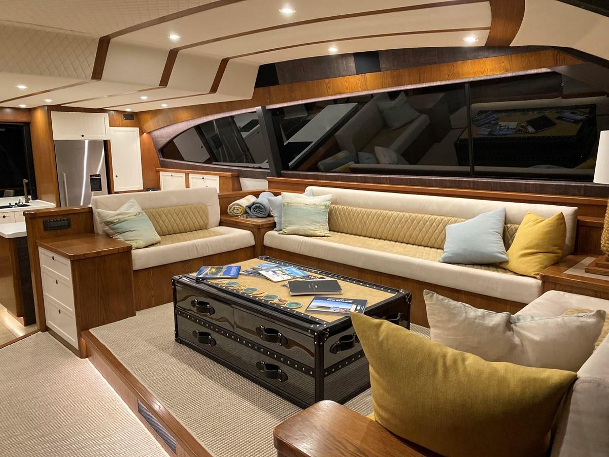a living room with a couch and a coffee table aboard THE KEYS Yacht for Sale