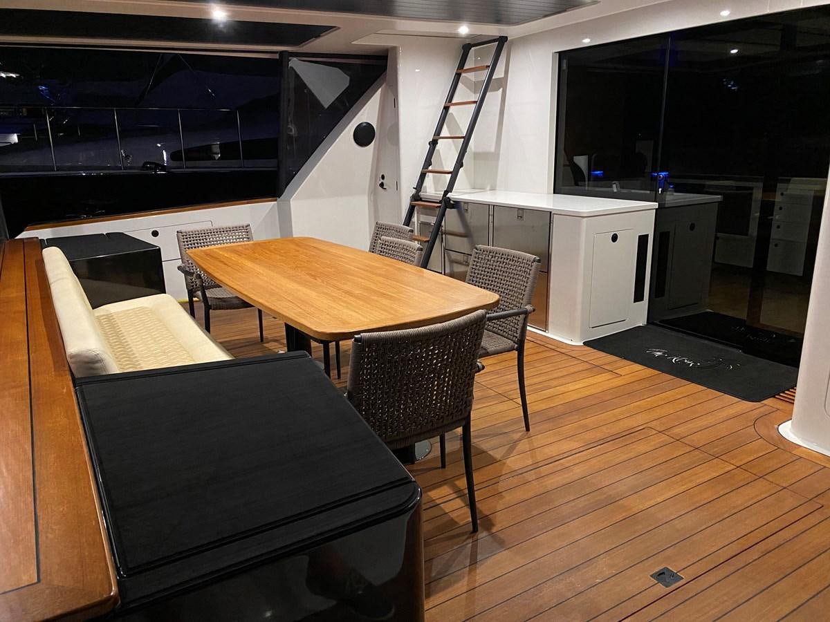 a room with a table and chairs aboard THE KEYS Yacht for Sale