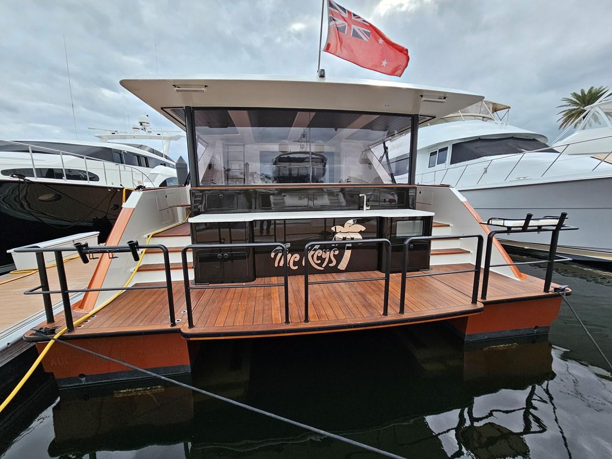 a boat docked at a pier aboard THE KEYS Yacht for Sale