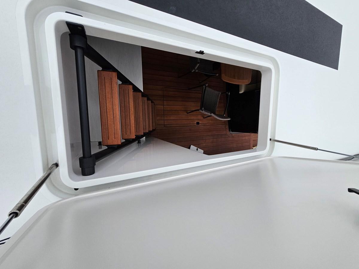 a white rectangular object with a black handle aboard THE KEYS Yacht for Sale