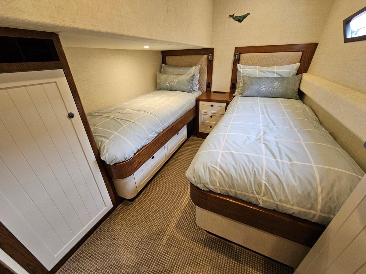 a couple of beds in a hotel room aboard THE KEYS Yacht for Sale