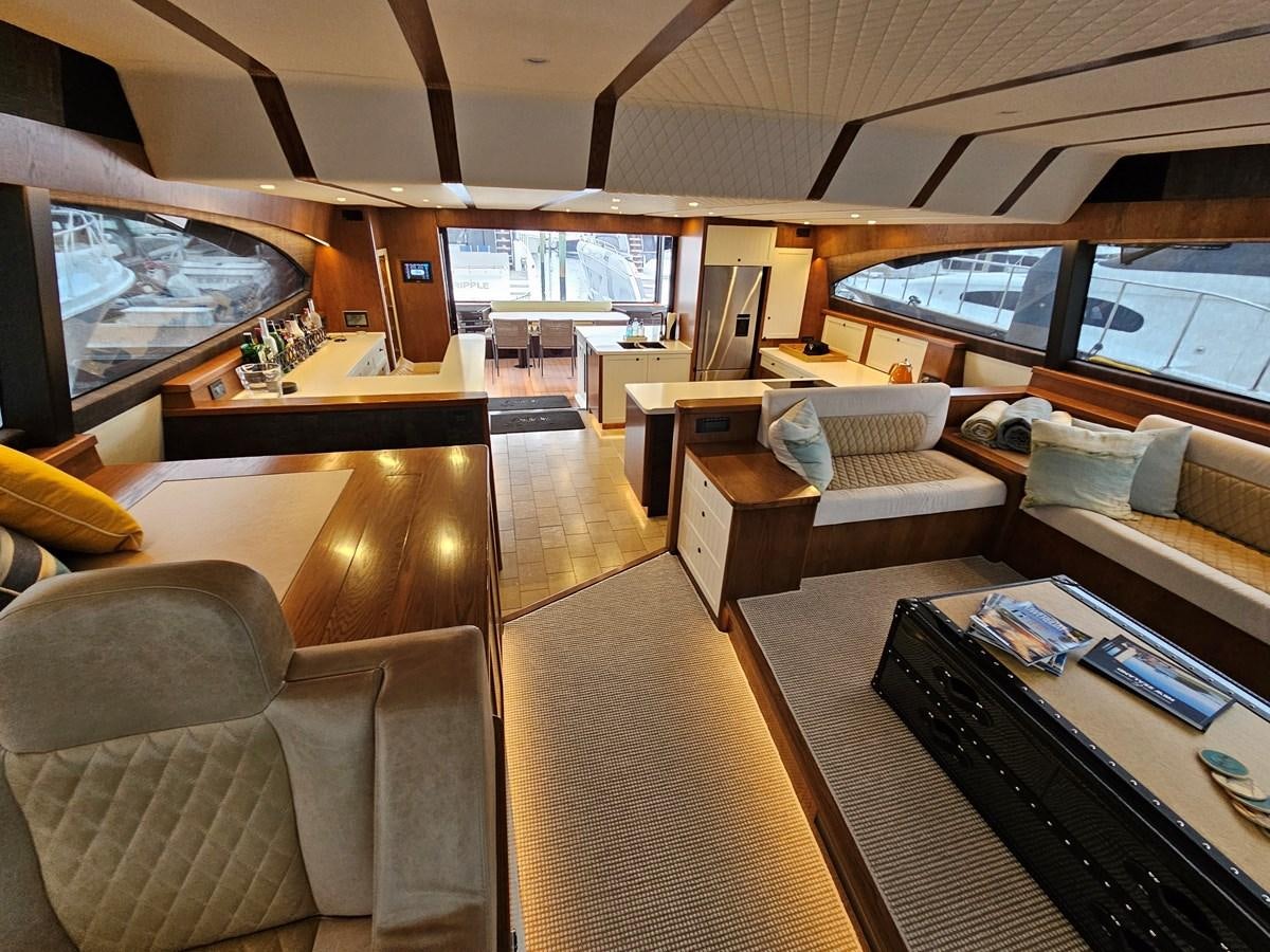 a room with a couch and a table aboard THE KEYS Yacht for Sale