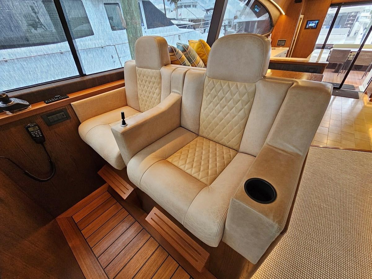 a couch in a room aboard THE KEYS Yacht for Sale