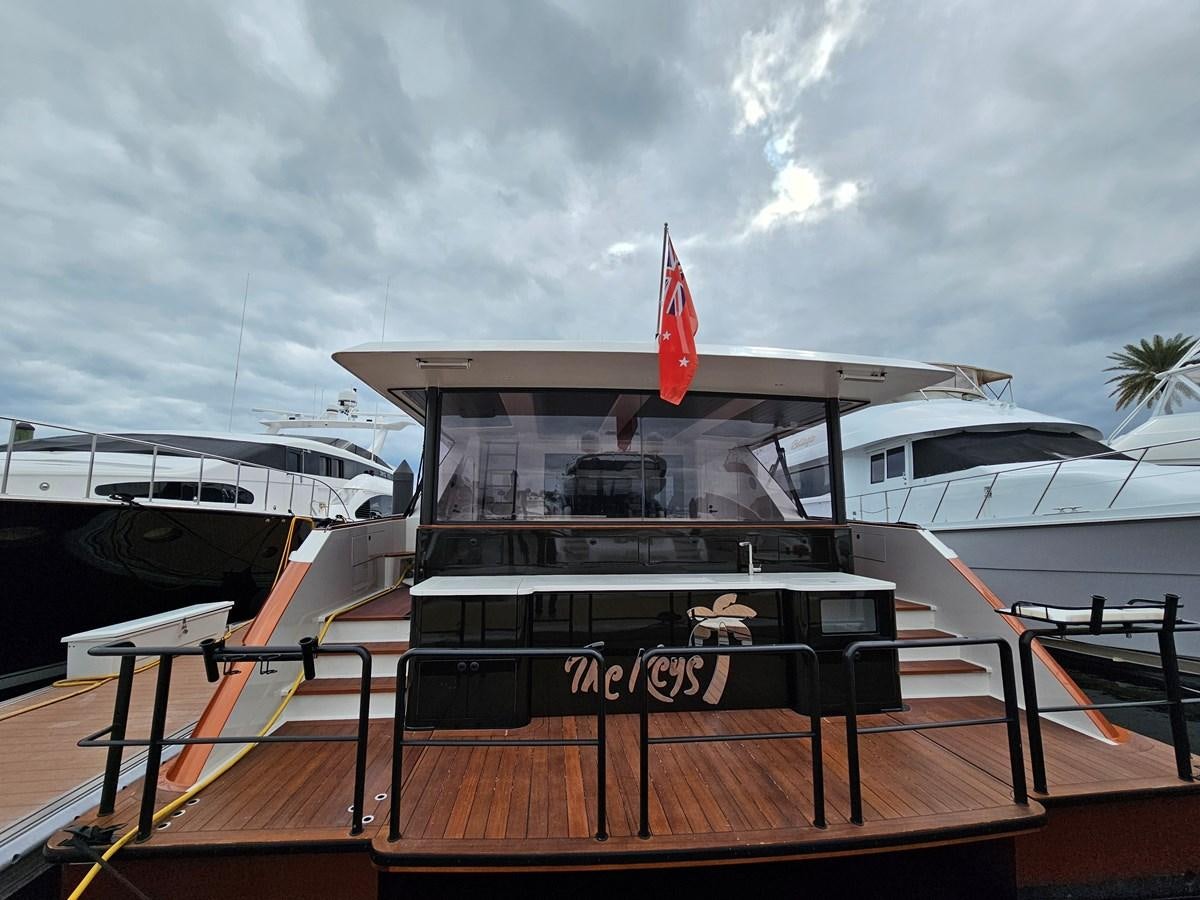 a boat docked at a pier aboard THE KEYS Yacht for Sale