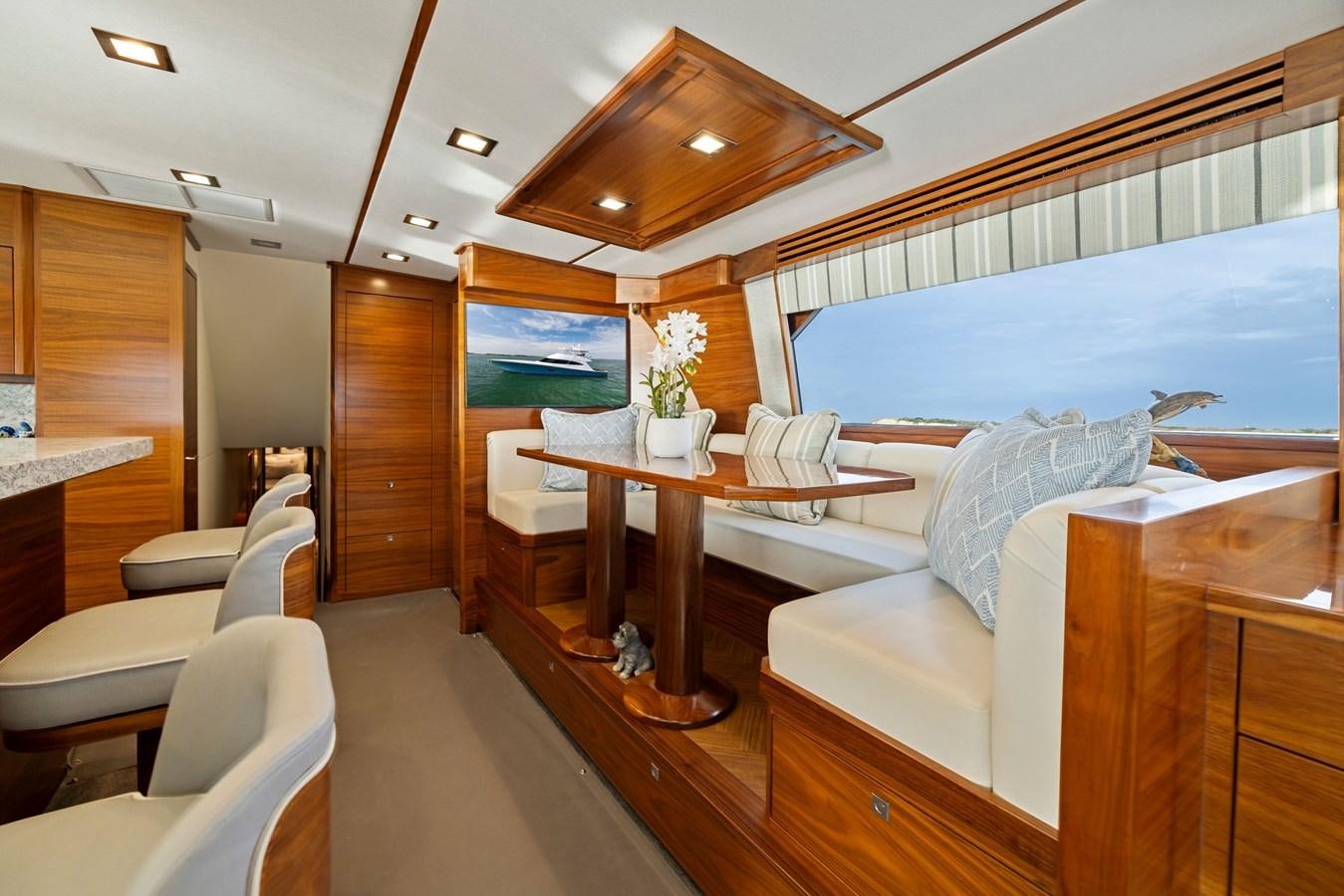a room with a table and chairs aboard ZATARA Yacht for Sale