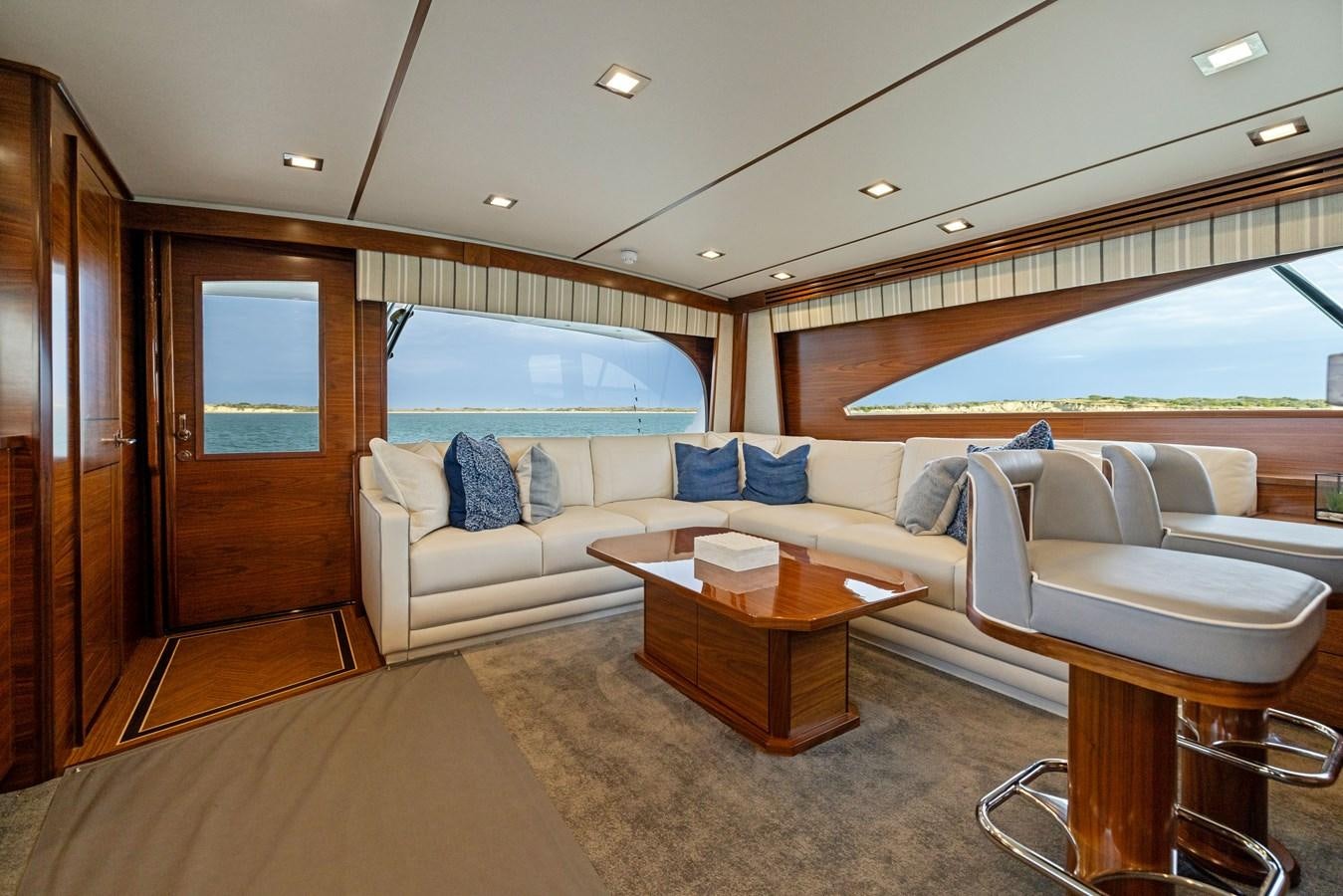 a living room with a couch and a table aboard ZATARA Yacht for Sale