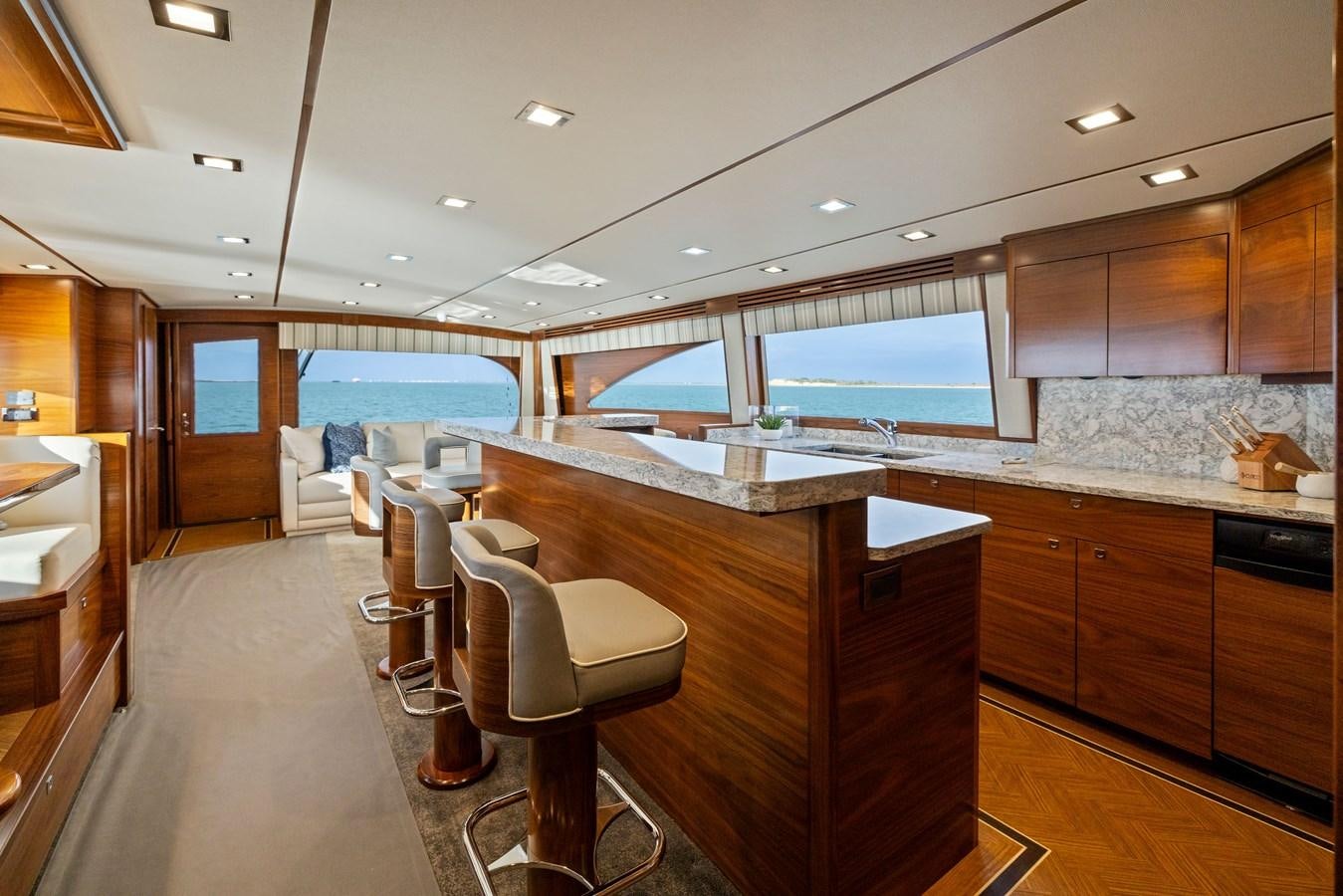 a large kitchen with a large island aboard ZATARA Yacht for Sale