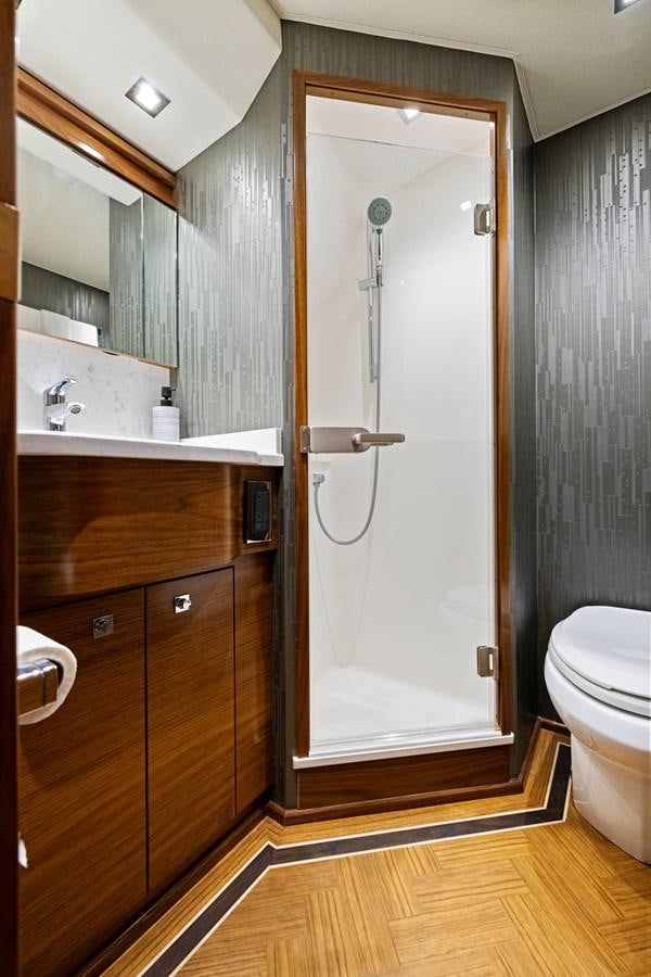 a bathroom with a shower unit and a toilet aboard ZATARA Yacht for Sale