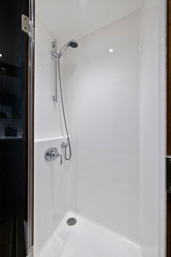 a shower with a white tub aboard ZATARA Yacht for Sale