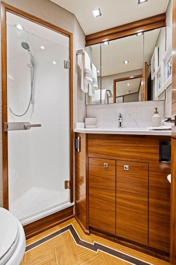 a bathroom with a shower and sink aboard ZATARA Yacht for Sale