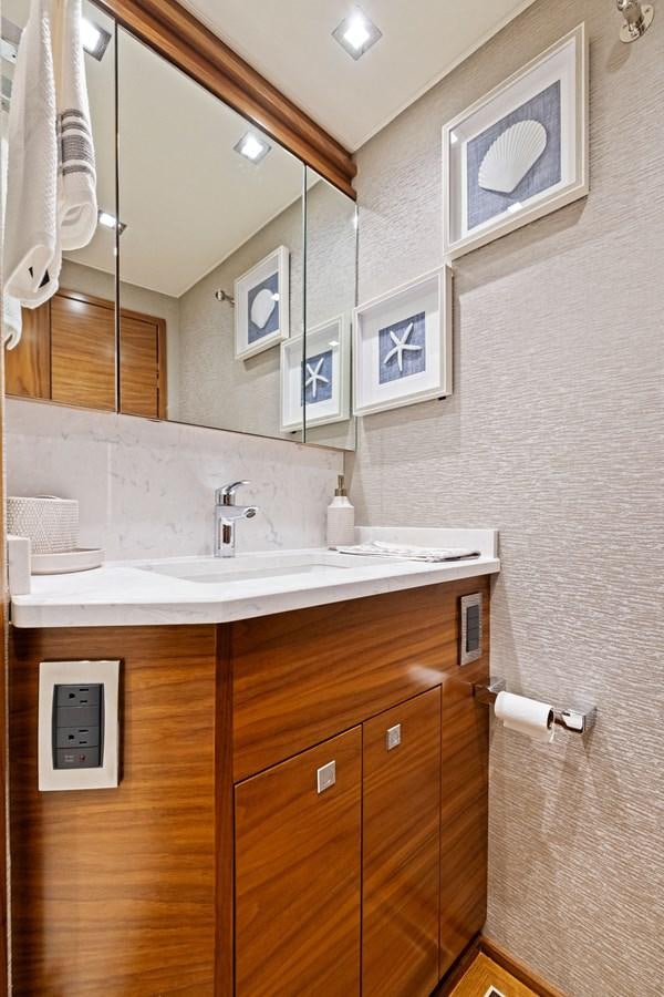 a bathroom with a sink and a mirror aboard ZATARA Yacht for Sale