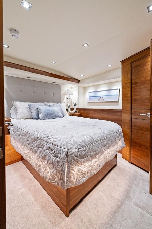a large bed in a room aboard ZATARA Yacht for Sale