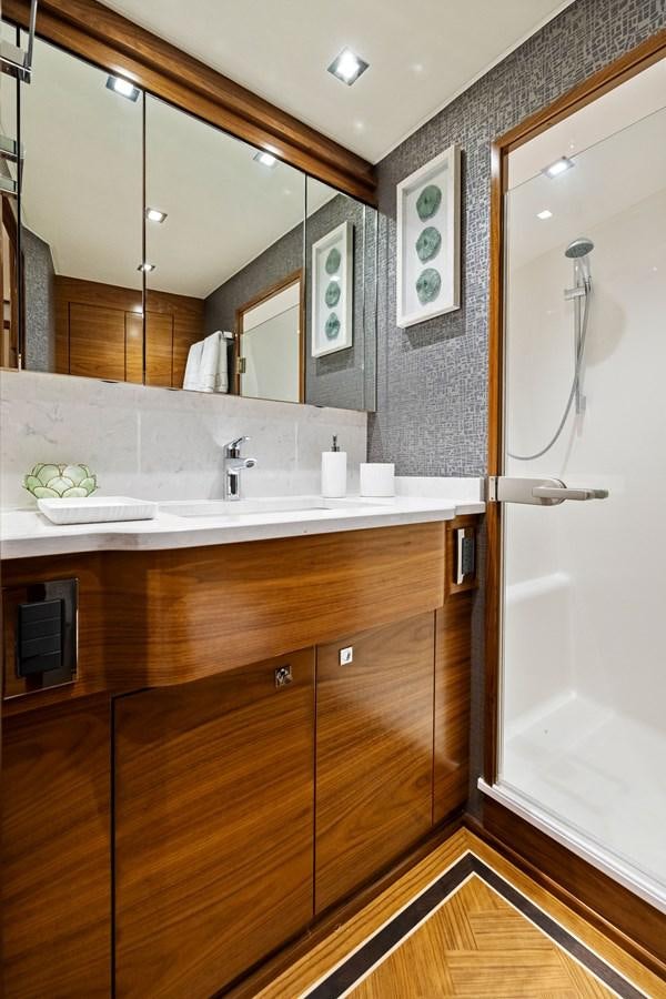 a bathroom with a large mirror aboard ZATARA Yacht for Sale