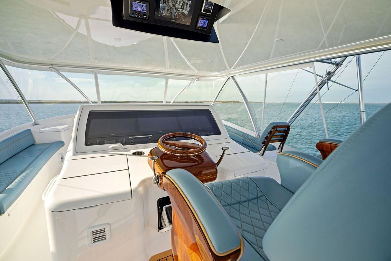 a boat with a brown leather seat aboard ZATARA Yacht for Sale