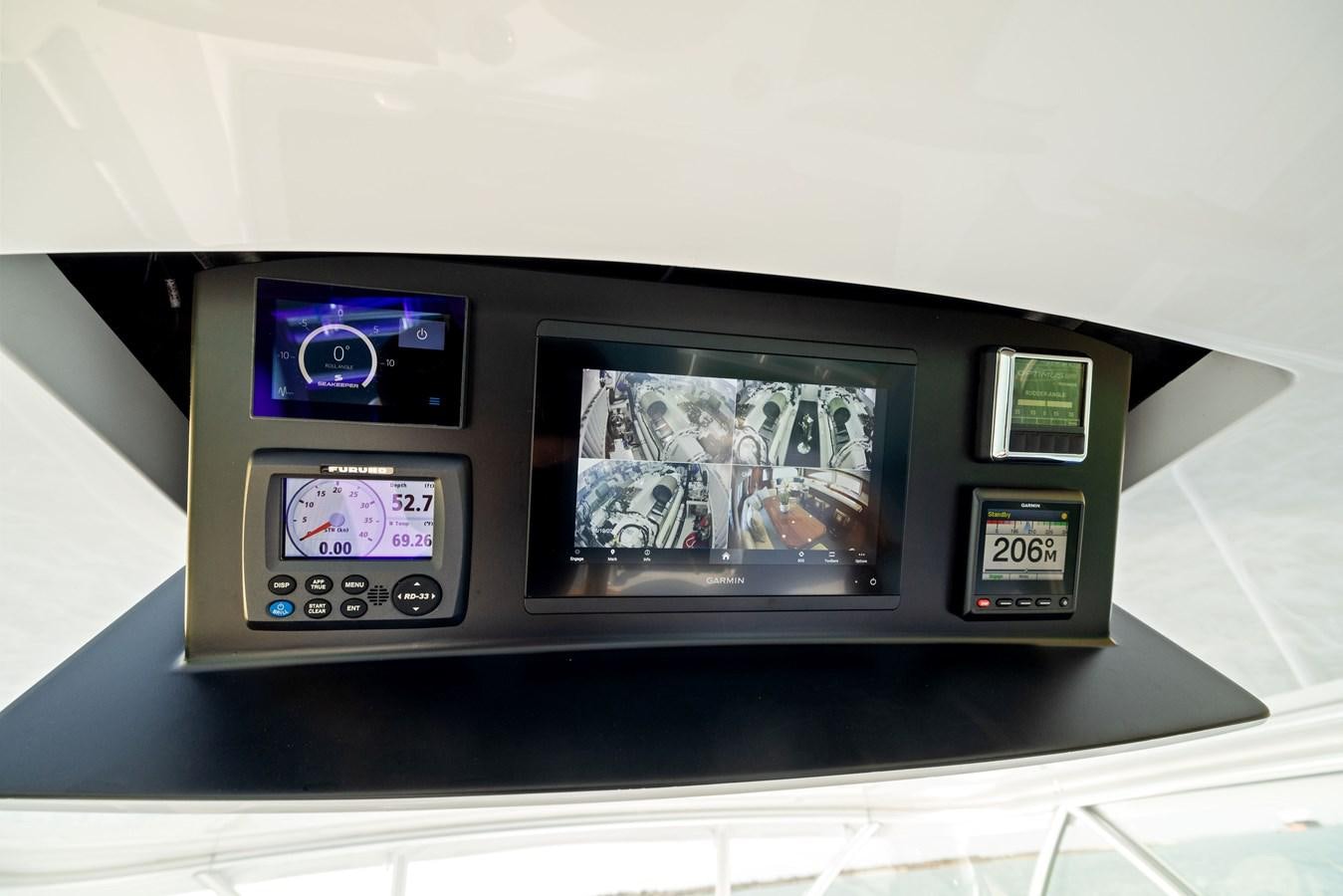 a display of a digital clock aboard ZATARA Yacht for Sale