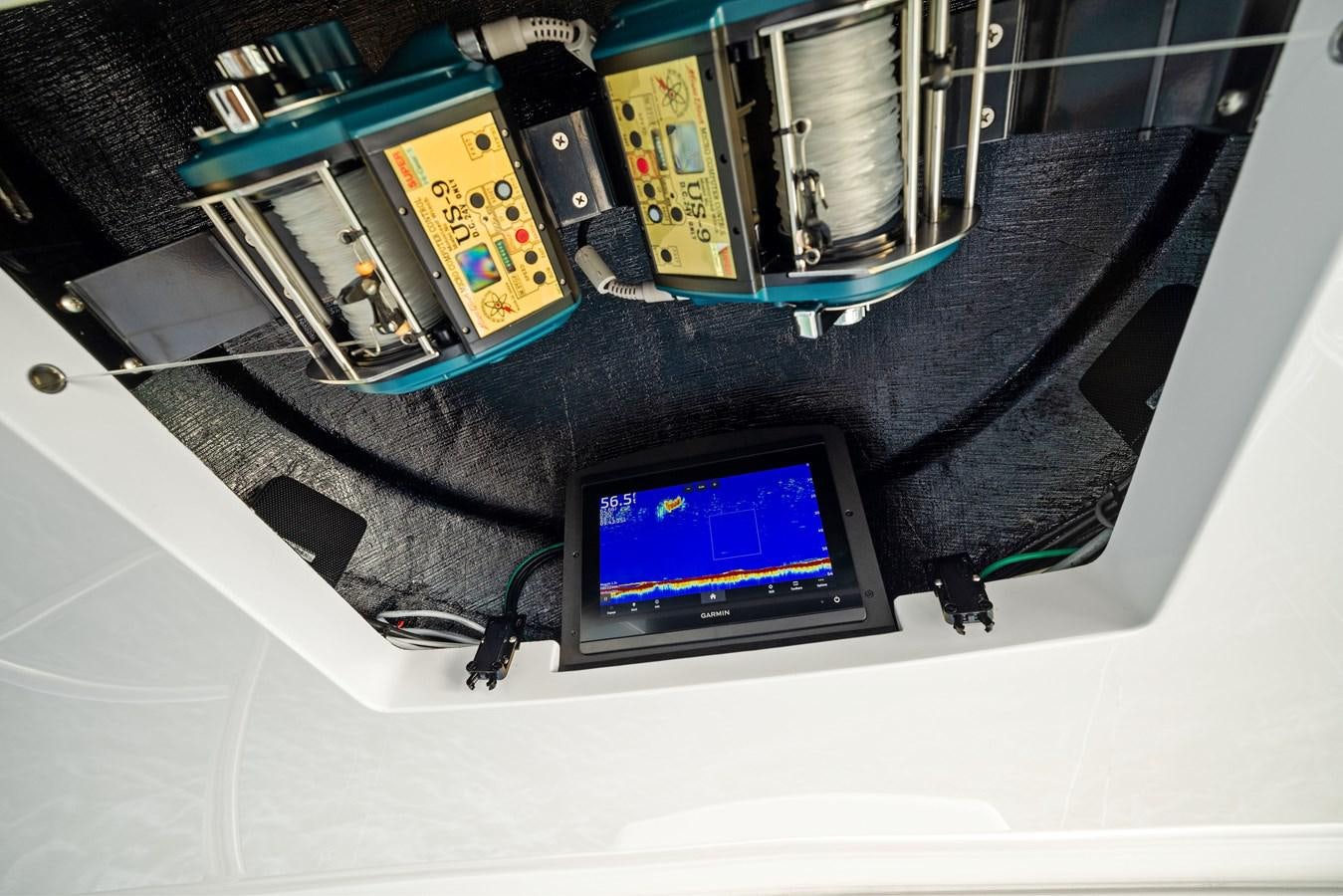 a computer on a table aboard ZATARA Yacht for Sale