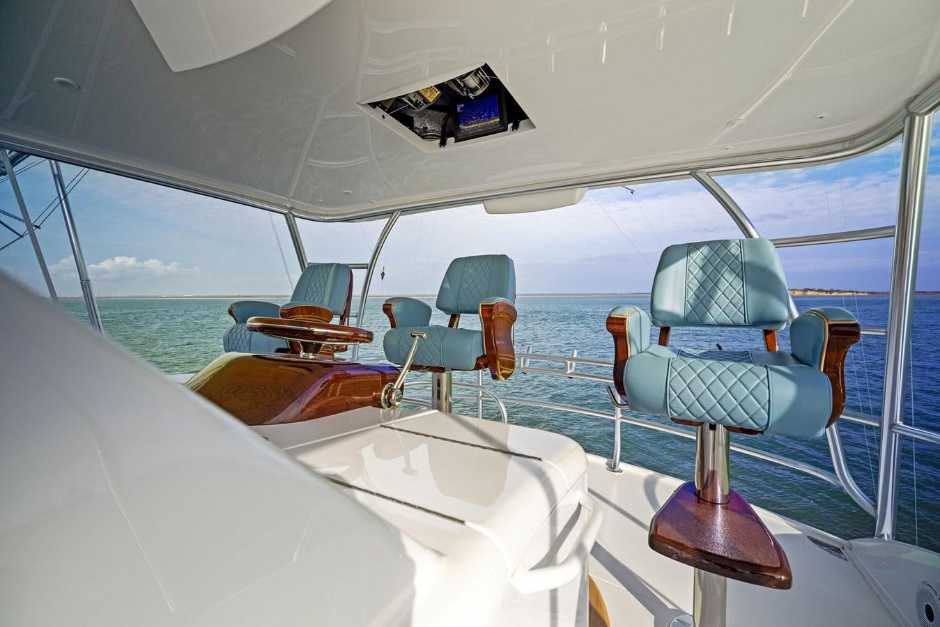 a boat with chairs and tables aboard ZATARA Yacht for Sale