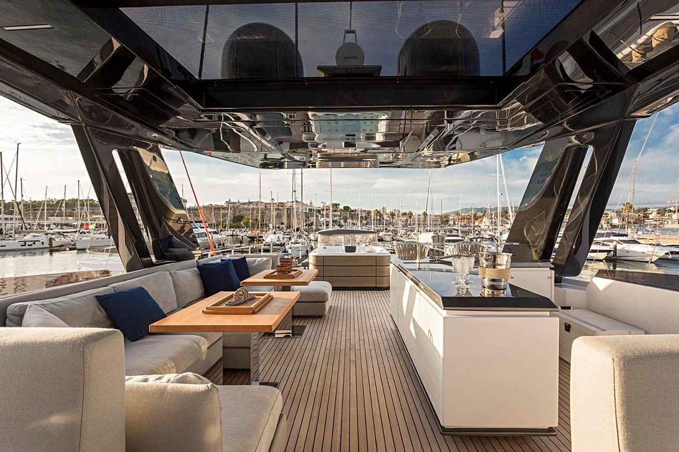 a room with a table and chairs aboard ANINHA I Yacht for Sale