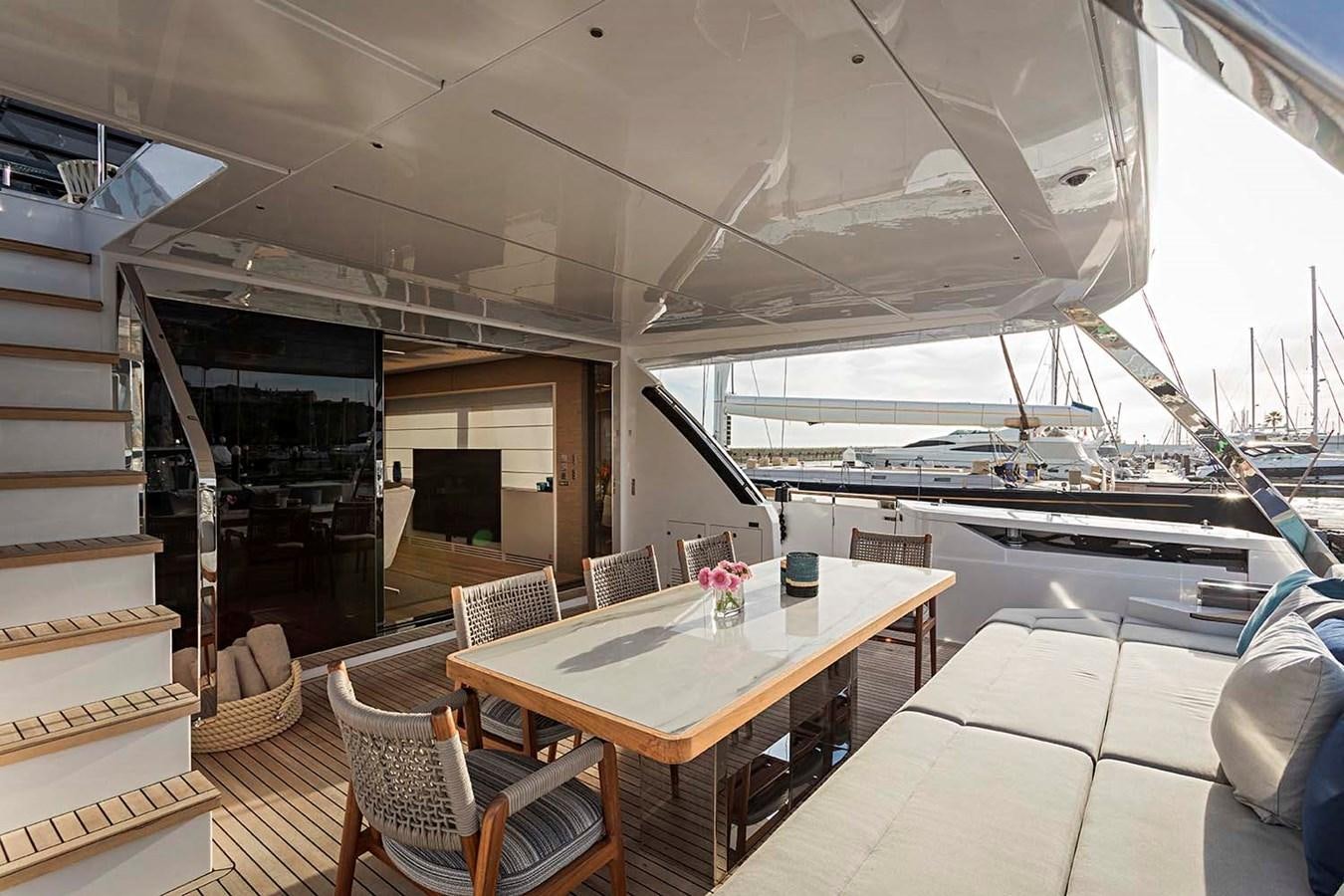 a boat with a table and chairs aboard ANINHA I Yacht for Sale