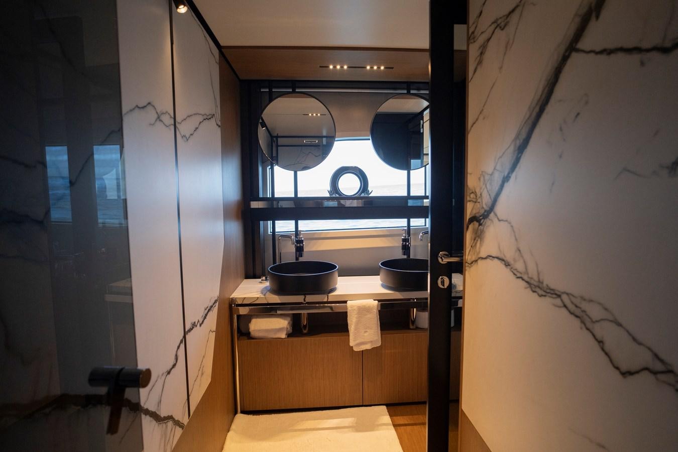 a kitchen with a sink and a window aboard SILVER MOON Yacht for Sale