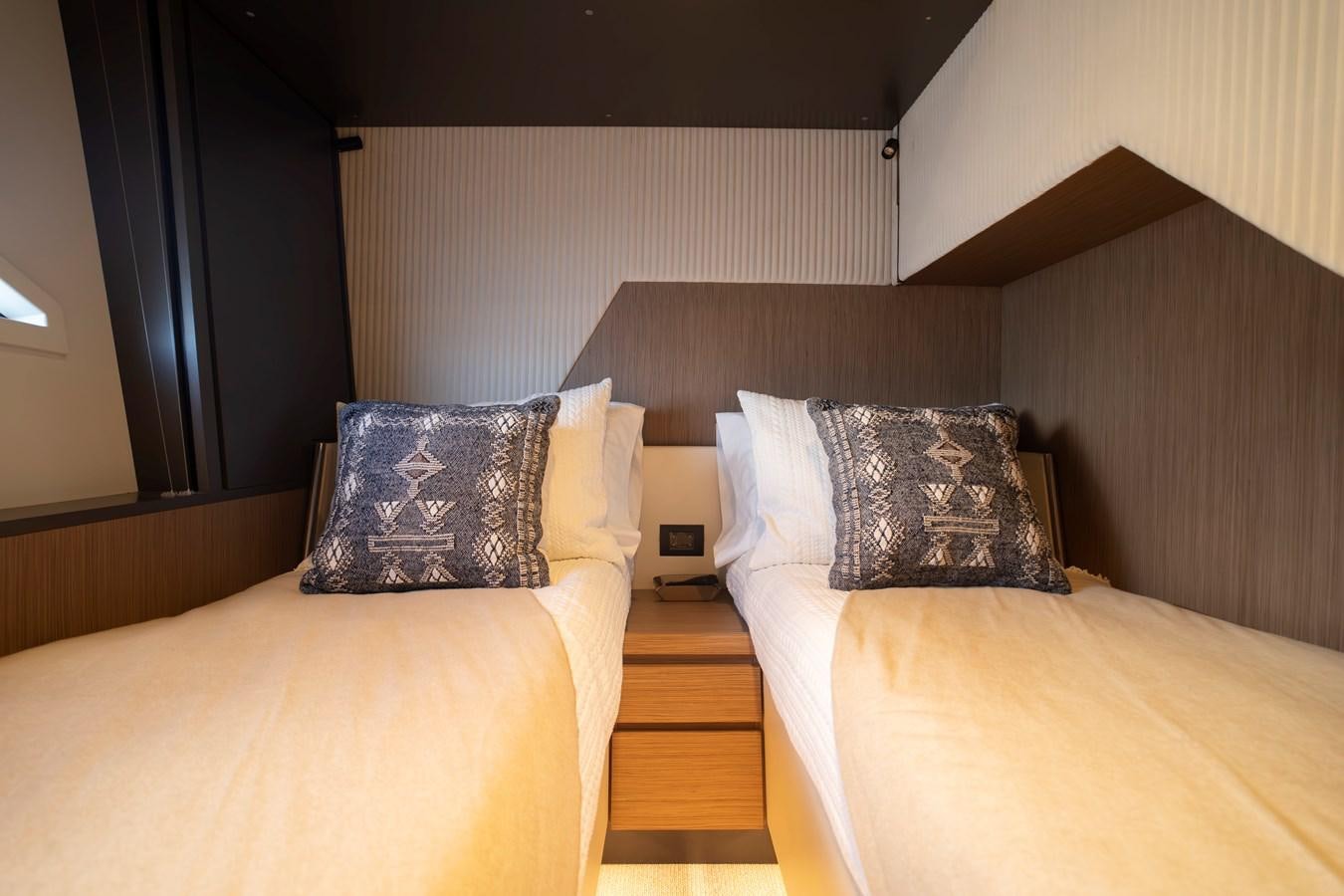 a couple of beds in a hotel room aboard SILVER MOON Yacht for Sale
