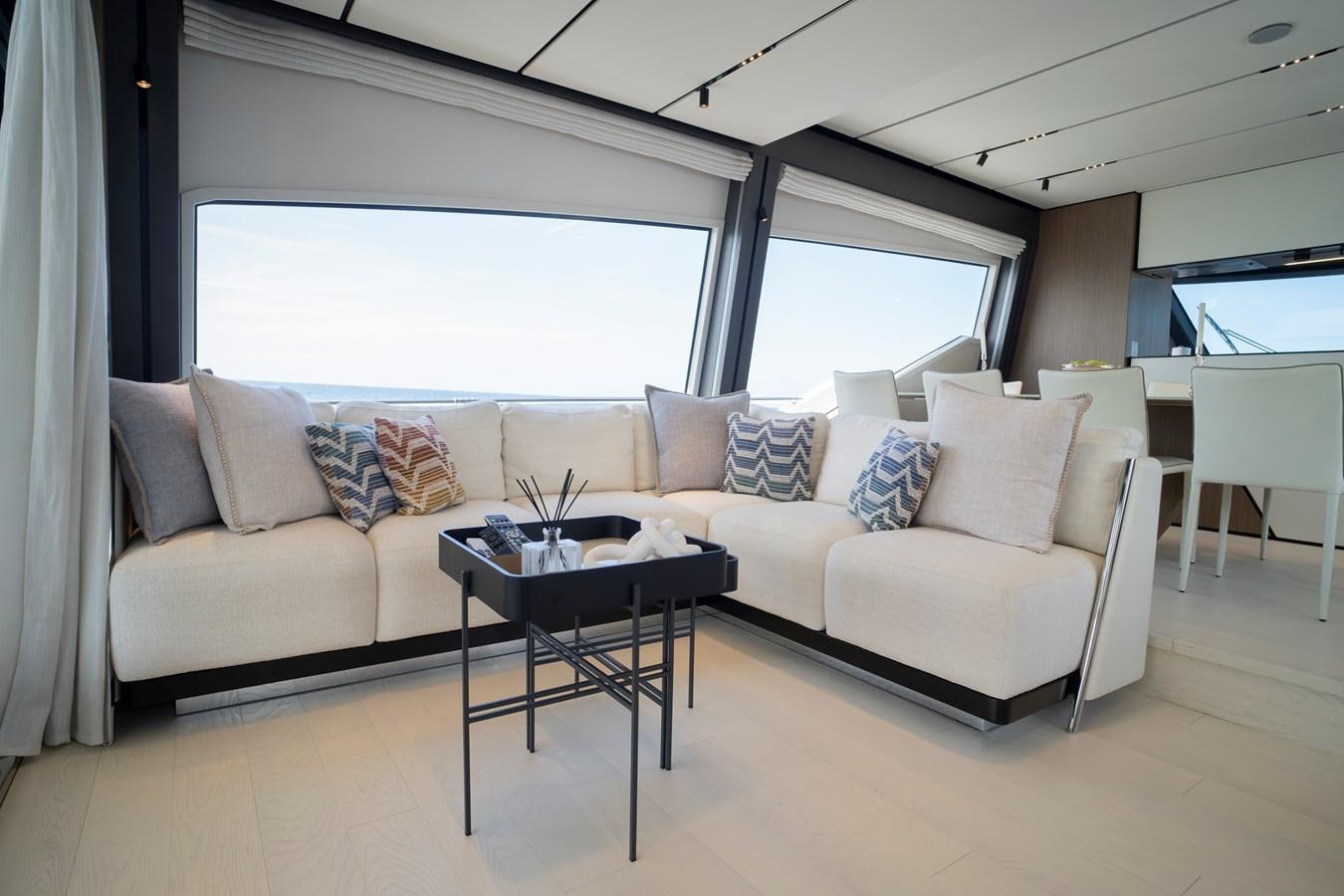 a white couch in a room aboard SILVER MOON Yacht for Sale