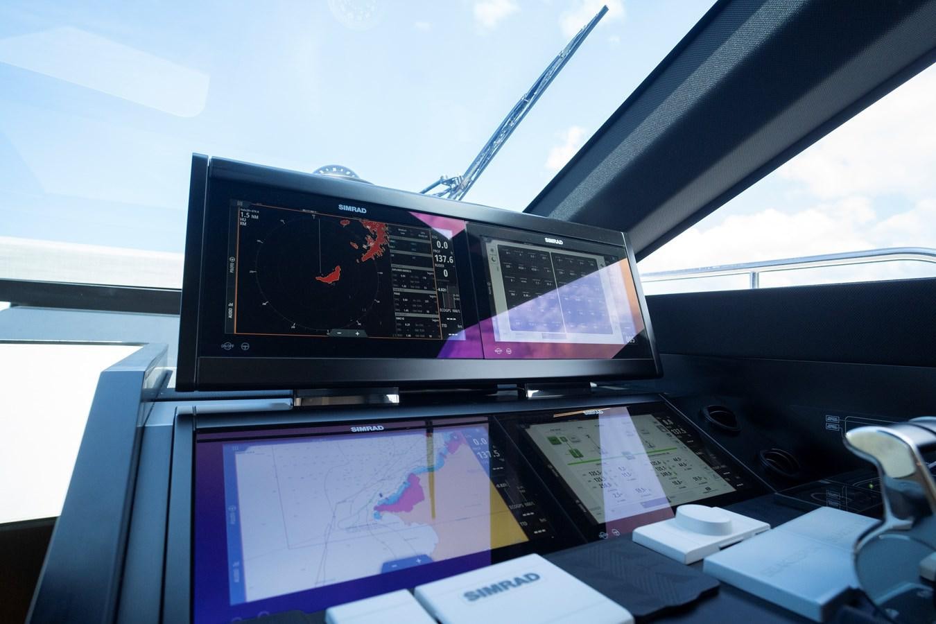 a black electronic device on a table aboard SILVER MOON Yacht for Sale