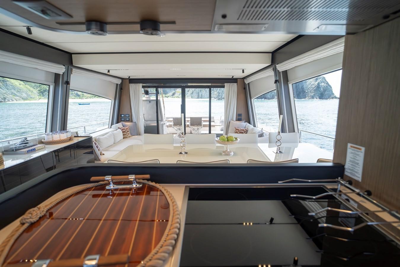 a room with a table and chairs aboard SILVER MOON Yacht for Sale