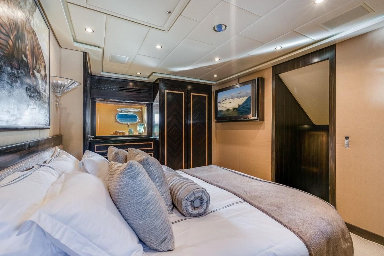 a bed with pillows aboard LEOPARD Yacht for Sale