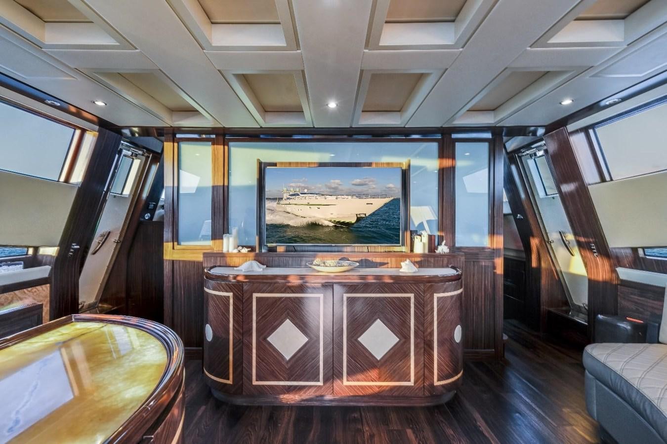 a room with a large painting on the wall aboard LEOPARD Yacht for Sale