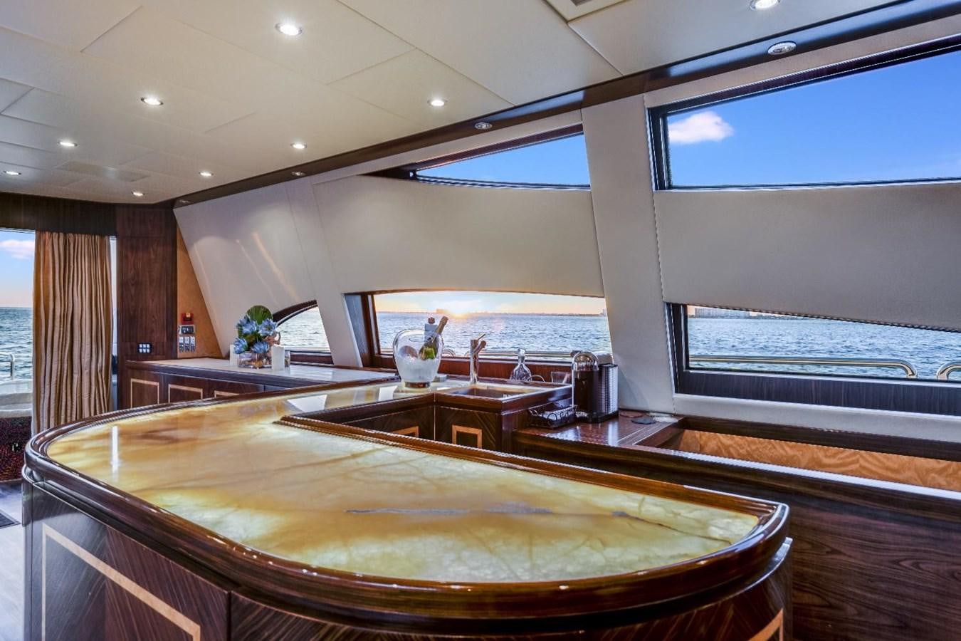a large kitchen with a large table aboard LEOPARD Yacht for Sale
