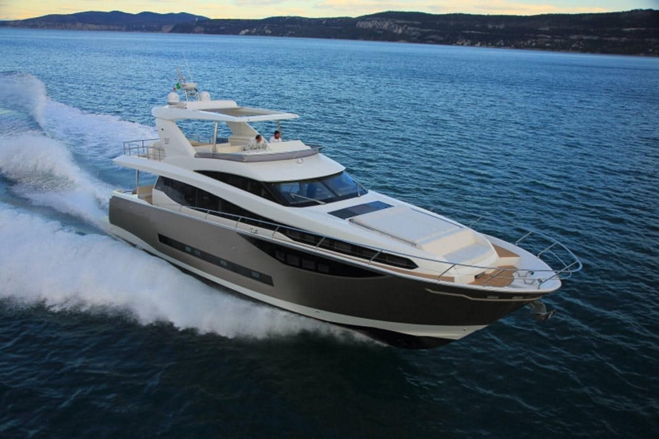 a white yacht on the water aboard 2016 PRESTIGE  750 Yacht for Sale