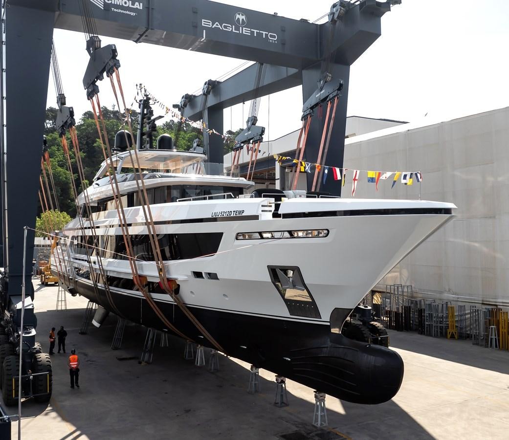 a white boat on display aboard BAGLIETTO T52 HULL #04 Yacht for Sale