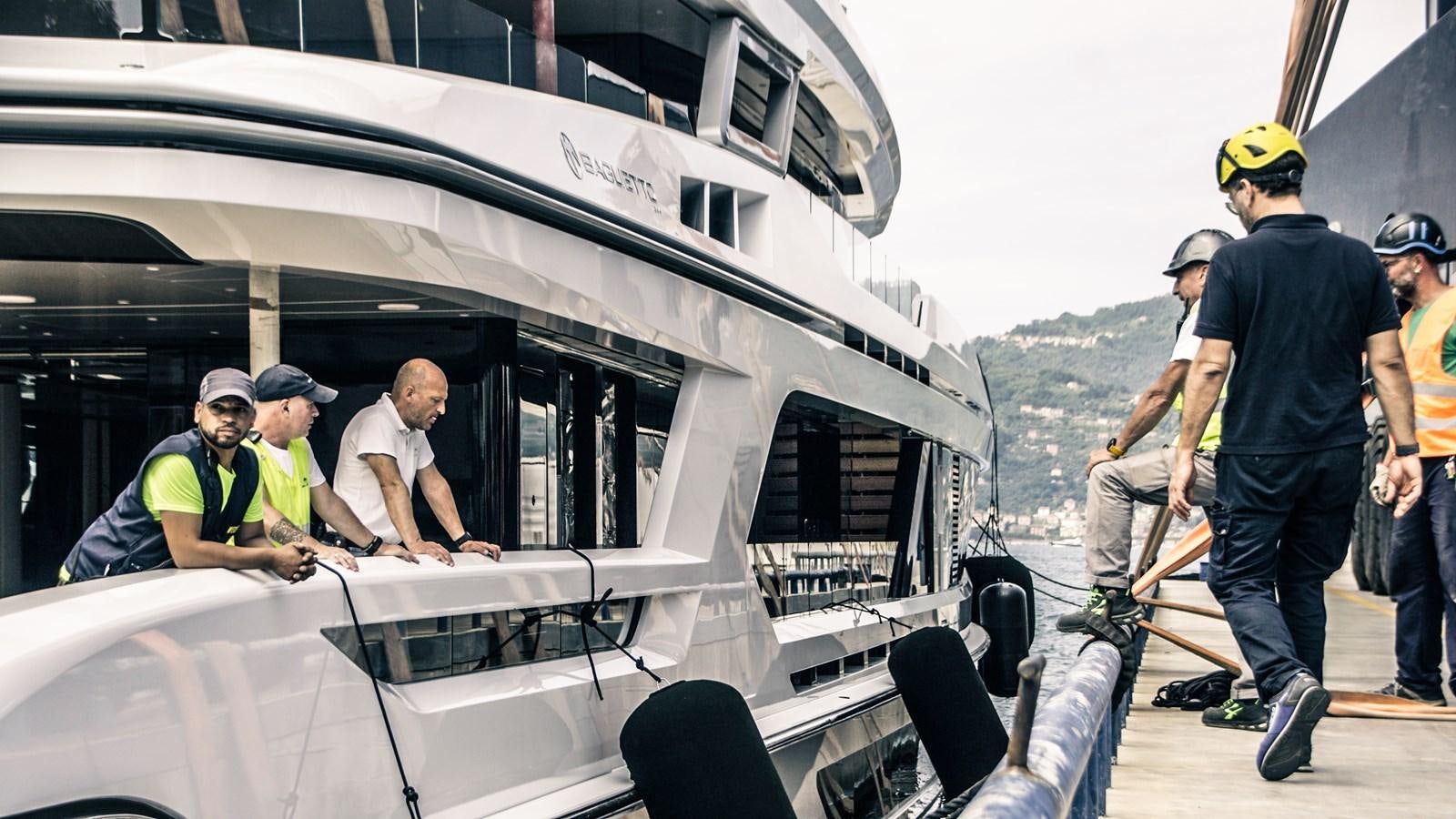 a group of people on a boat aboard BAGLIETTO T52 HULL #04 Yacht for Sale