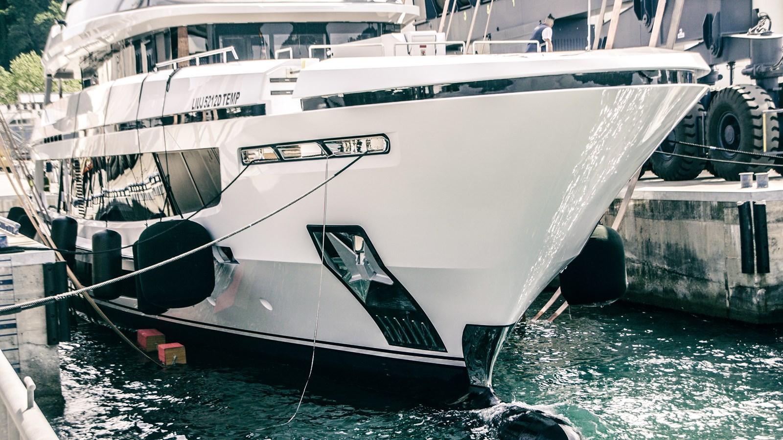 a boat docked at a pier aboard BAGLIETTO T52 HULL #04 Yacht for Sale