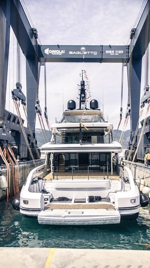 a large white boat aboard BAGLIETTO T52 HULL #04 Yacht for Sale