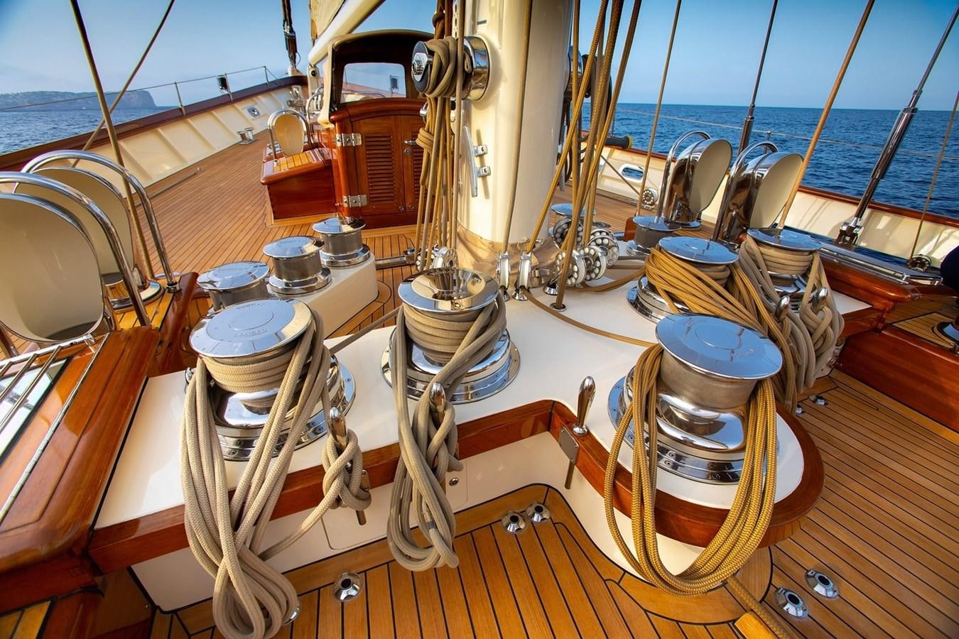 a wooden boat with a large drum set on it aboard LETHANTIA Yacht for Sale