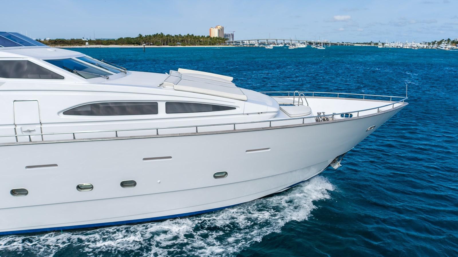 a white yacht on the water aboard ENDLESS SUN Yacht for Sale