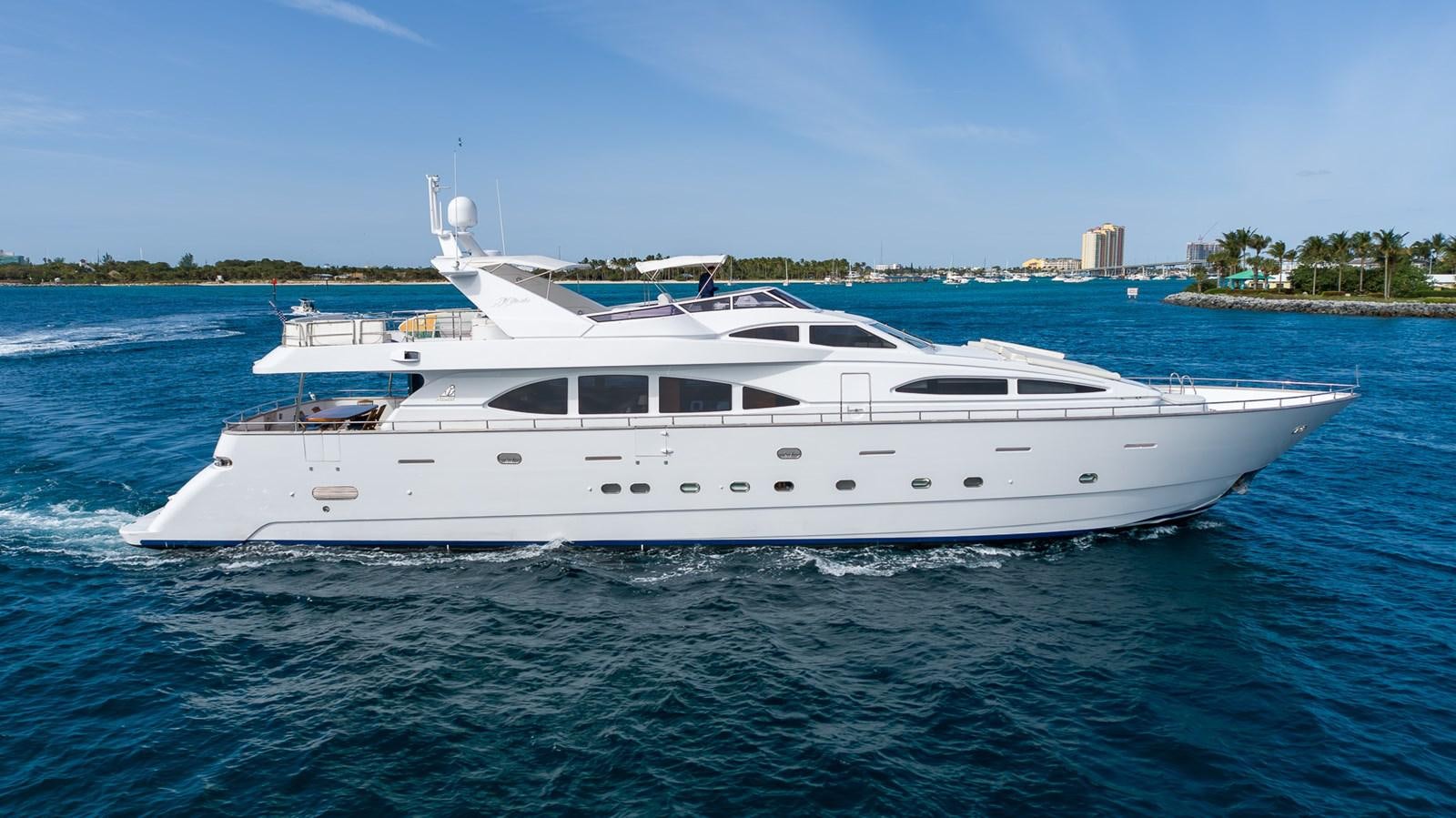 a white yacht on the water aboard ENDLESS SUN Yacht for Sale