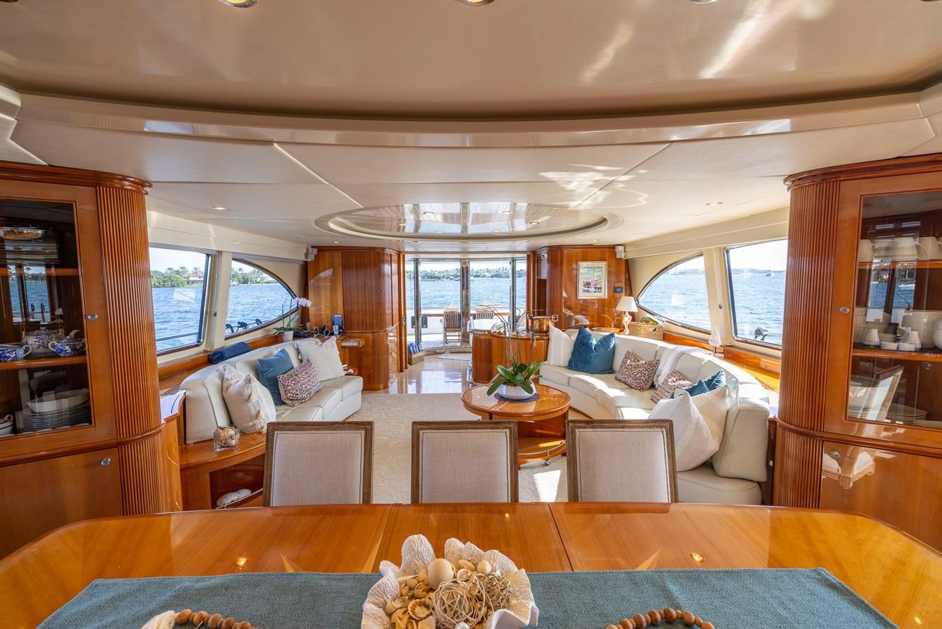 a living room with a large window aboard ENDLESS SUN Yacht for Sale